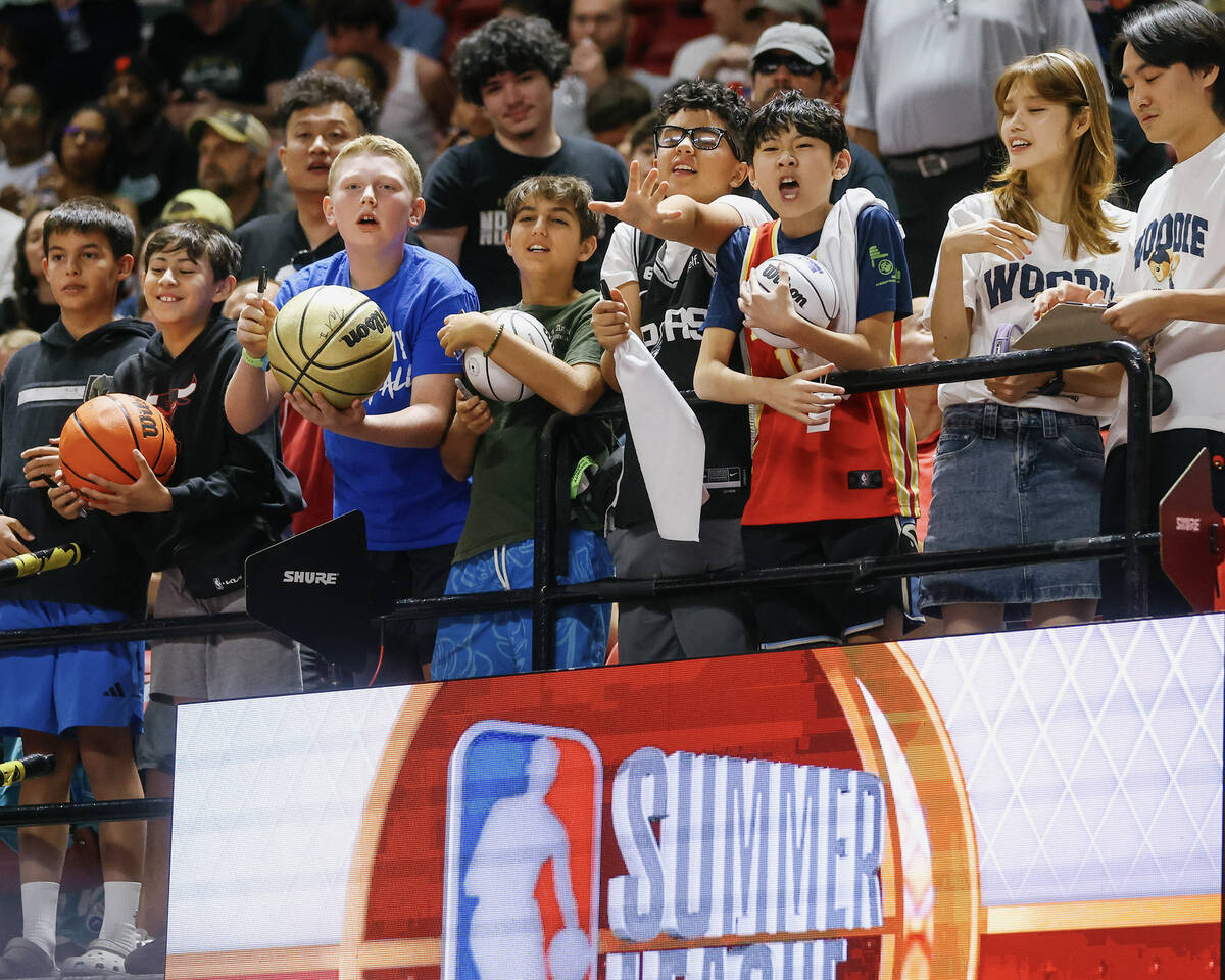 Basketball fans try to get a player’s attention between games in the 2026 NBA Summer Lea ...