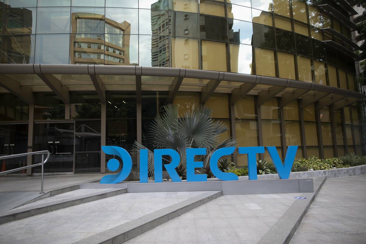 A DirectTV logo identifies the company's headquarters in Caracas, Venezuela, Friday, May 22, 20 ...