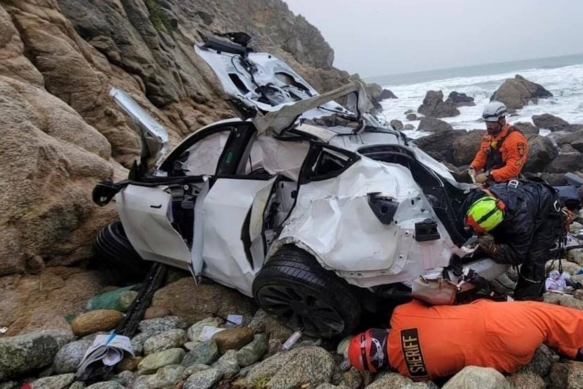 In this photo provided by the San Mateo County Sheriff's Office, emergency personnel respond to ...