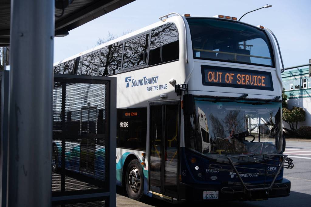 A Sound Transit express bus on Friday, March 27 at Everett Station in Everett, Washington. (Will Geschke / The Herald)