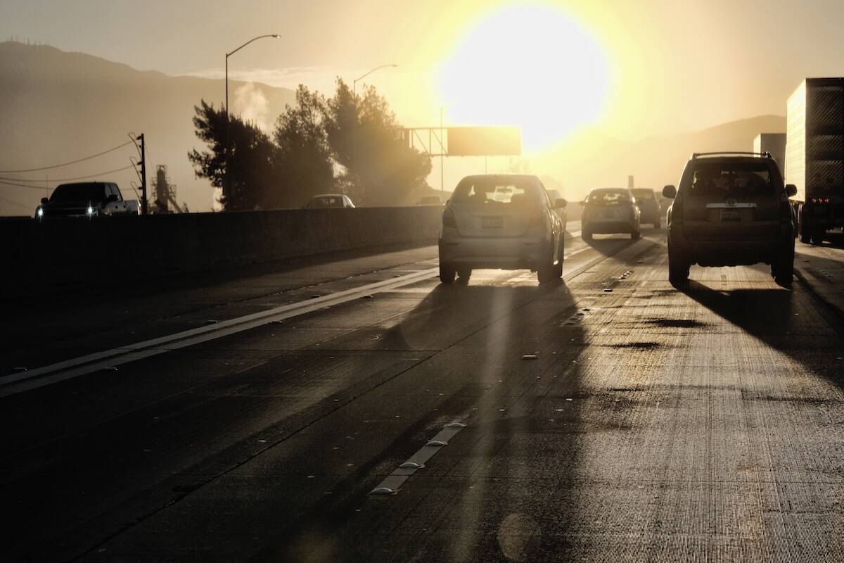 In this Aug. 31, 2018, 2018 photo morning commuters drive into downtown Los Angeles as the sun ...