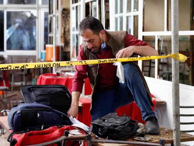 an emergency service member works at the site of what syrian state media reported was a blast at a cafe in central damascus syria july 2 2026 photo reuters