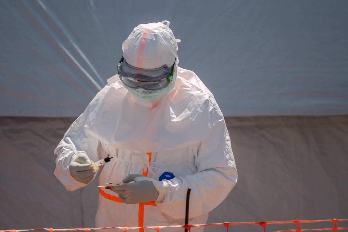 Dozens at an Ebola treatment center in northeast Congo go on strike over unpaid salaries and bonuses