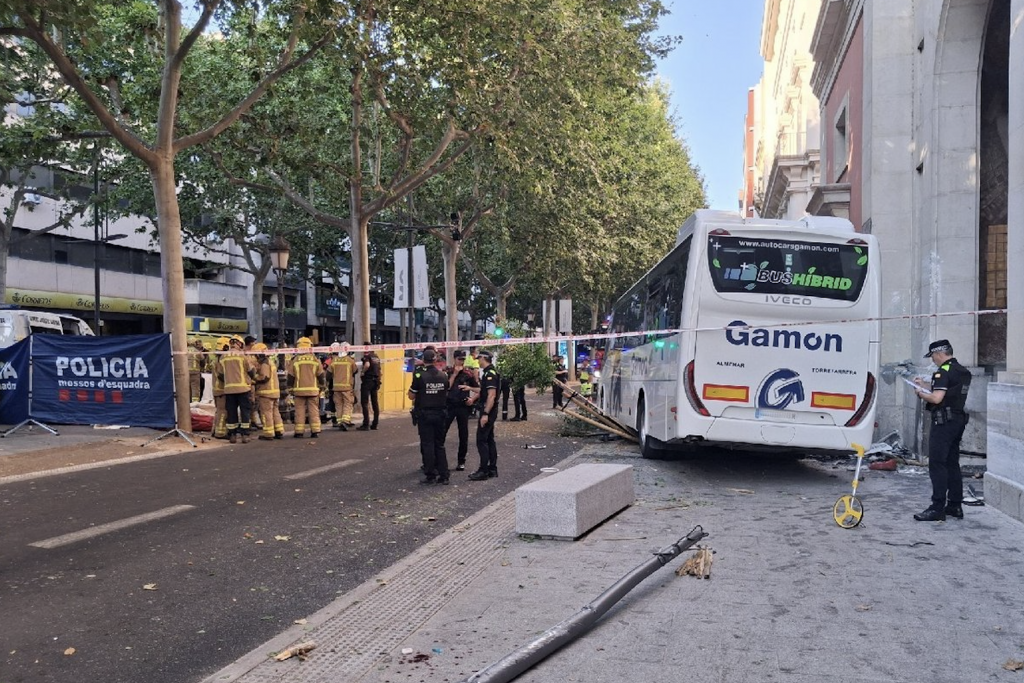 Dozens injured, including four critically, after bus ploughs into building in Catalonia