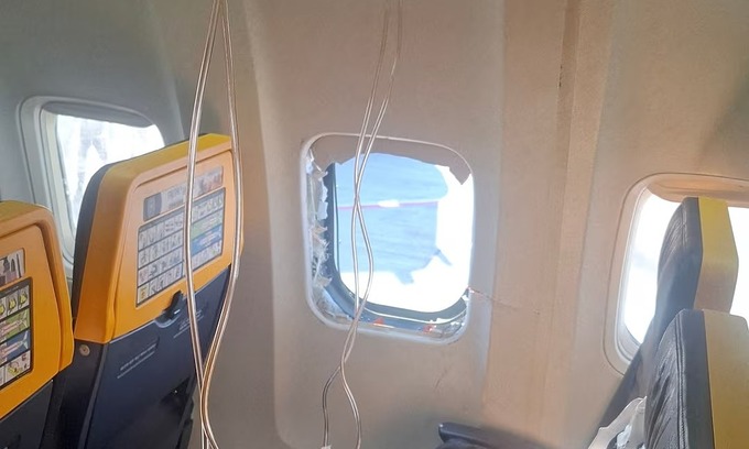 Europe's biggest airline blames foreign object for passenger sucked halfway out of window