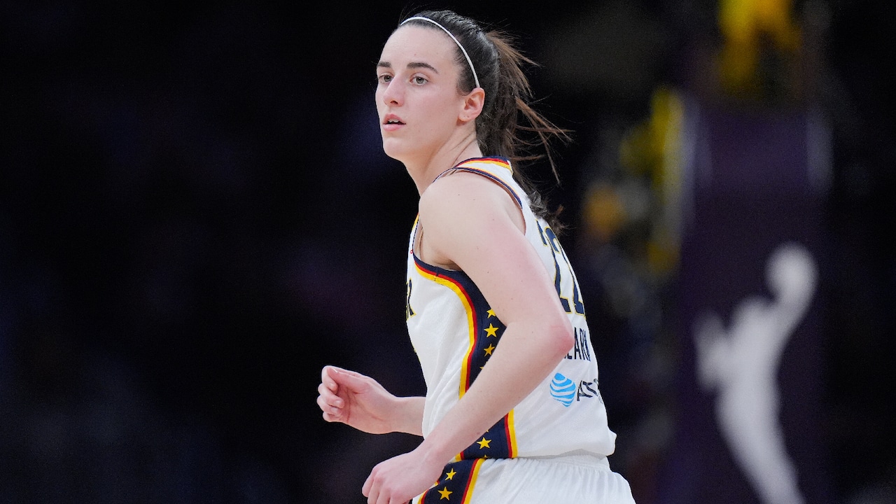 Caitlin Clark running down the court during game between Indiana Fever and Los Angeles Sparks (2026).