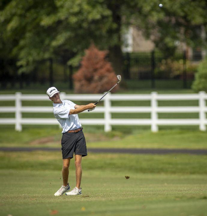 Gators’ Wade shares medalist honors; Purples take team title