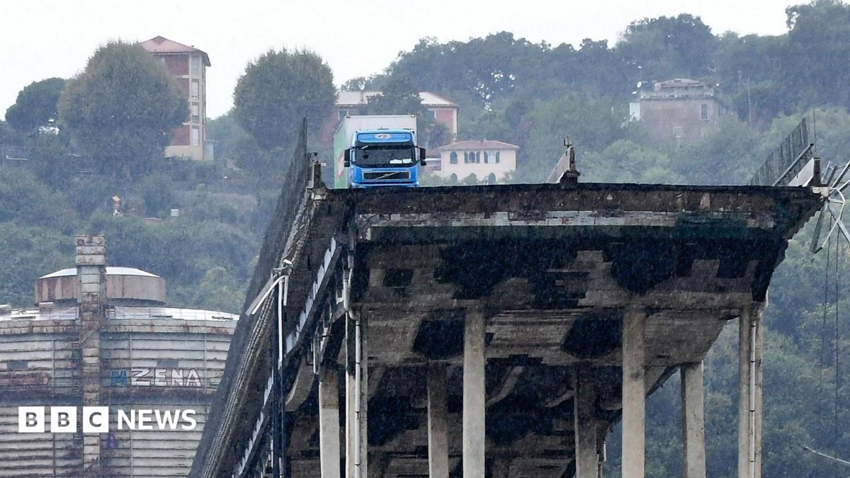 A lorry perched on top of the Genoa bridge after its collapse