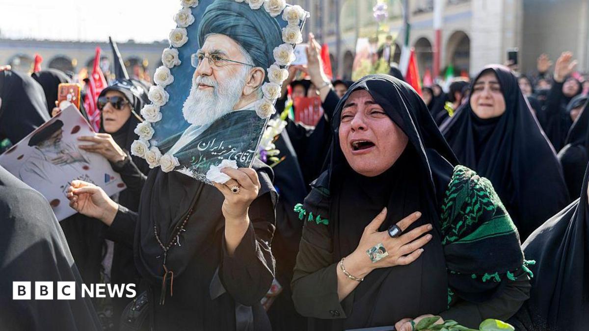 A woman weeps as people gather at the Imam Khomeini Grand Mosalla for a farewell ceremony for Iran's late Ayatollah Ali Khamenei