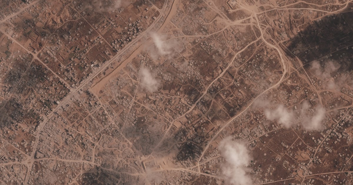 Israel is quietly building a miles-long earthen barrier inside Gaza, entrenching its division