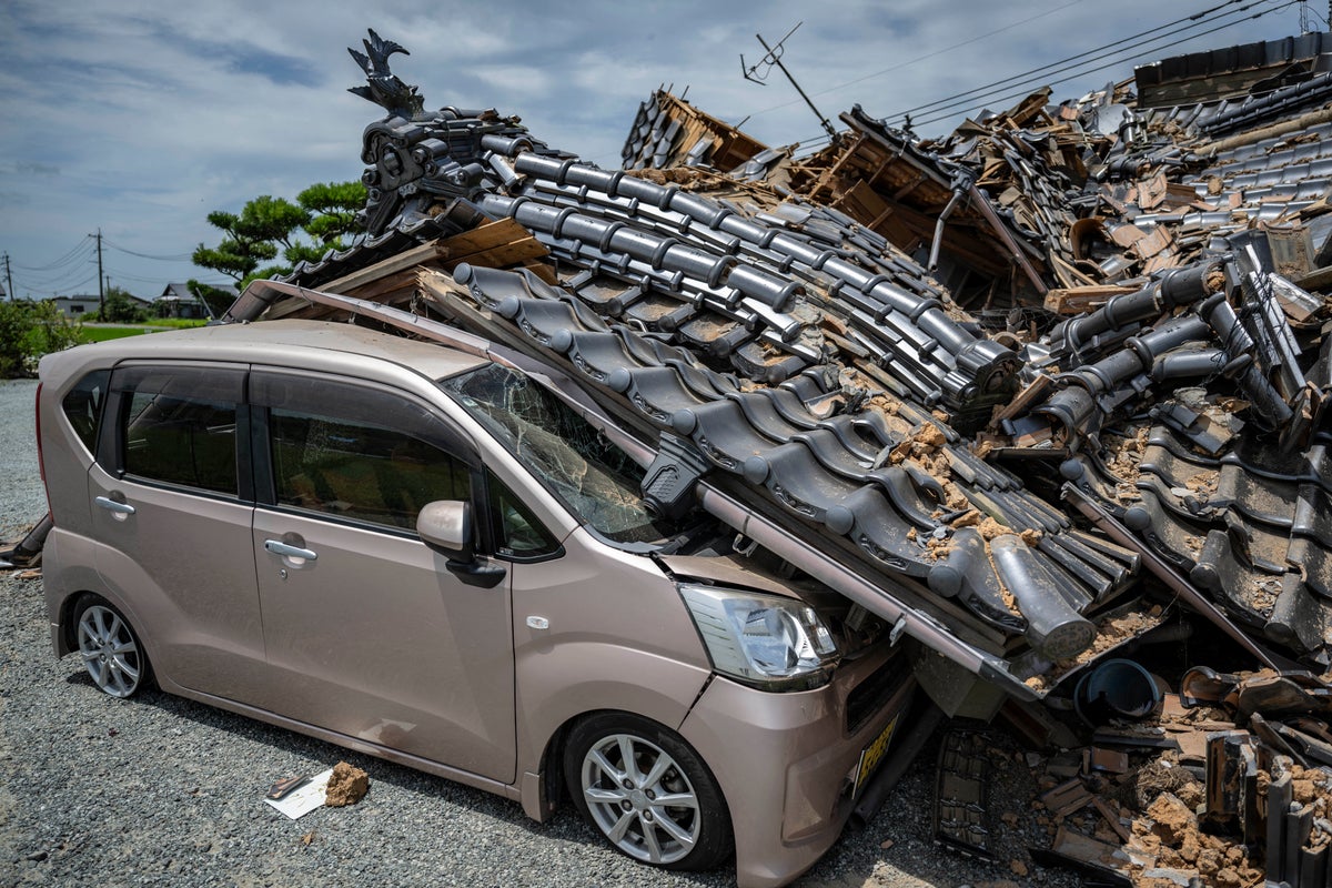 Japan earthquake death toll rises to 34 as another body pulled from collapsed mall