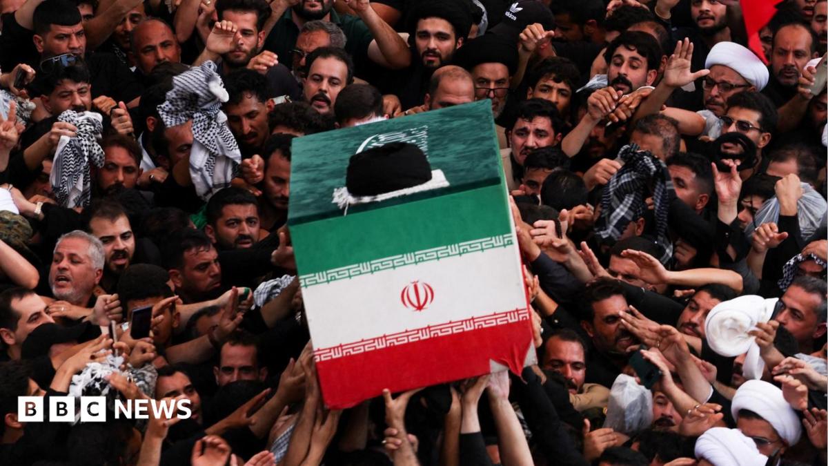 The coffin of Iran's late Supreme Leader Ayatollah Ali Khamenei is carried during a funeral procession at the Imam Ali shrine in Najaf, Iraq (8 July 2026)