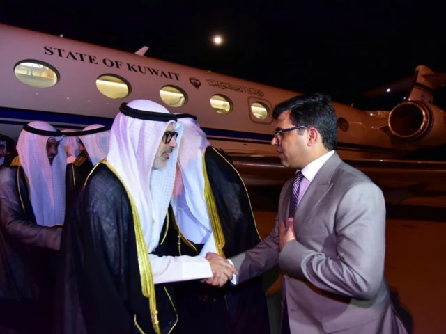 additional secretary for the middle east zahid hussain receives kuwait s foreign minister sheikh jarrah jaber al ahmad al sabah upon his arrival in islamabad on tuesday photo fo
