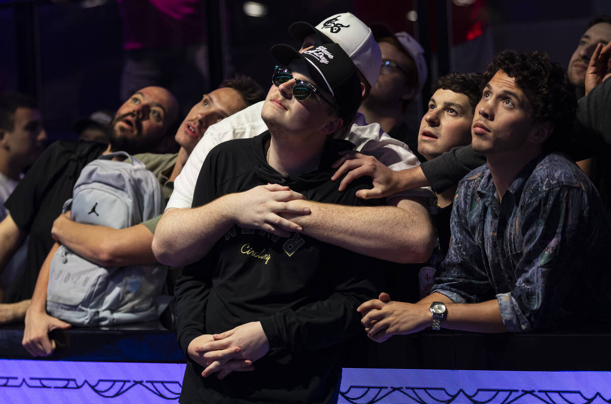 Lucas Jumalon, right, stands with supporters while playing during Day 8 of the World Series of ...