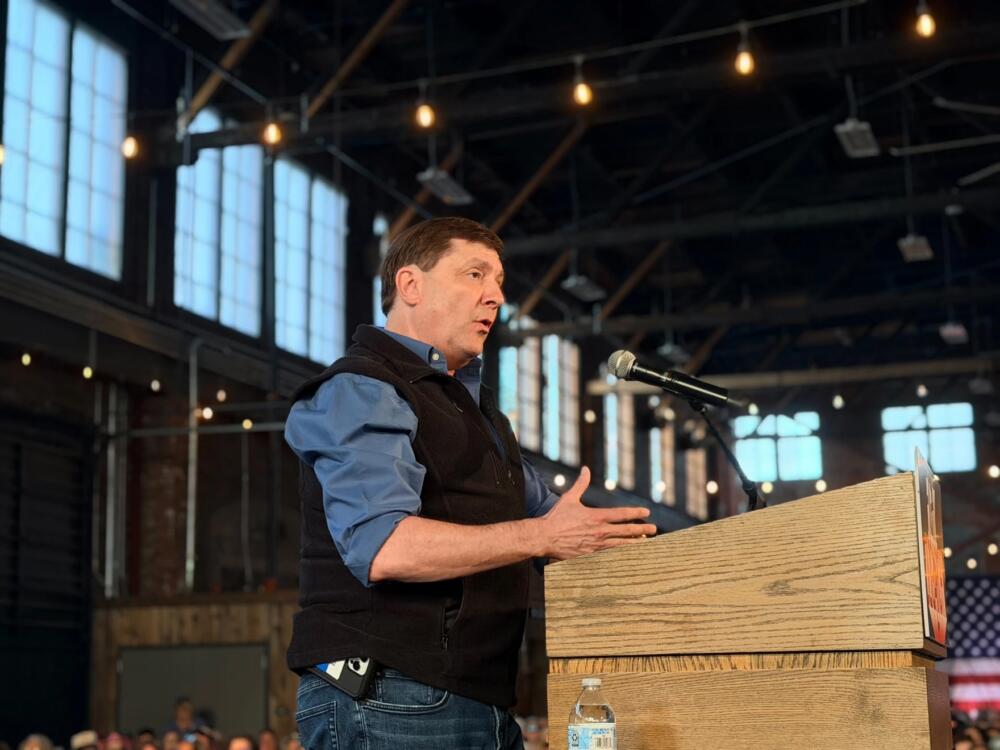 Troy Jackson speaks at a Fighting Oligarchy rally in Portland on Monday, May 25, 2026. (Tulley Hescock/Maine Public)