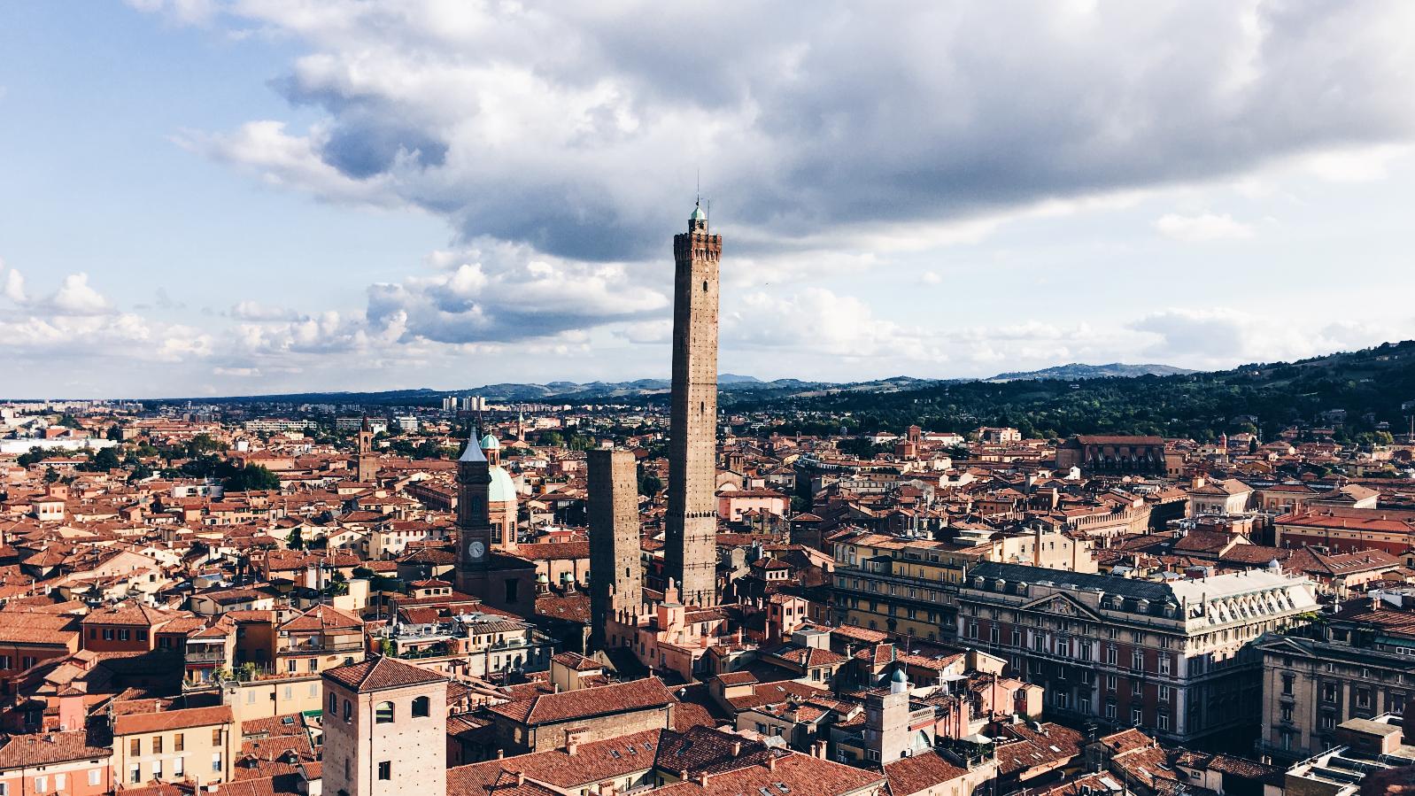 Leaning tower of Bologna and sister tower. The city's mayor accused the government of sending blackshirts in November 2024 to the city Man dies after being restrained by police in Bologna