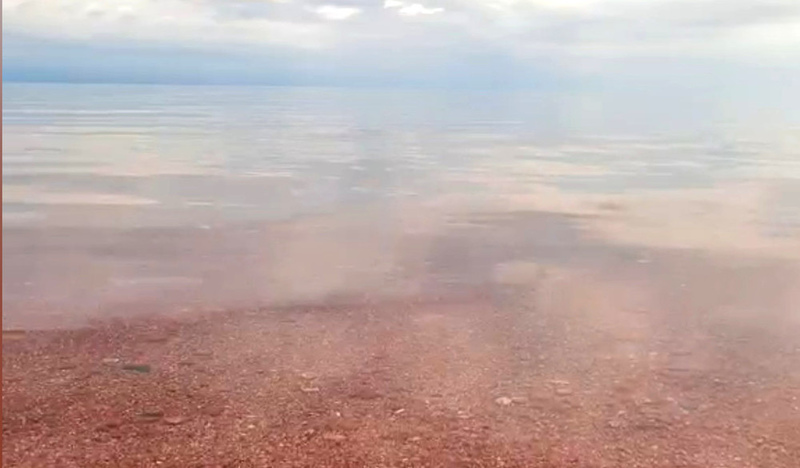 Martian sands in Kyrgyzstan? The mind-bending secret behind Lake Issyk-Kul's vibrant red beach