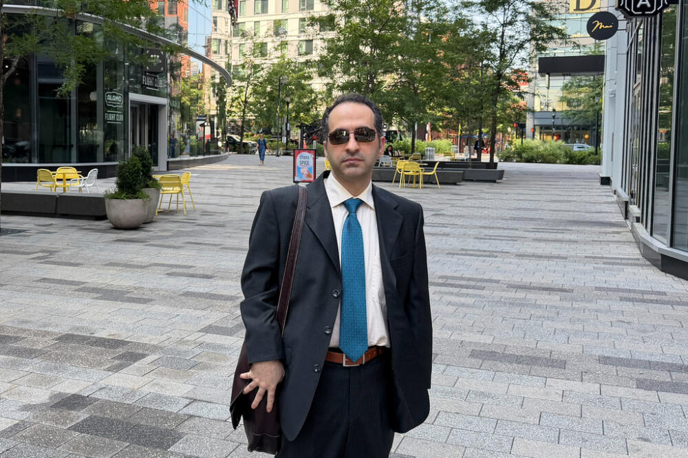 Iranian American defendant Mahdi Mohammad Sadeghi poses for a photo Friday, July 10, 2026, before heading into federal court in Boston. (Michael Casey/AP)