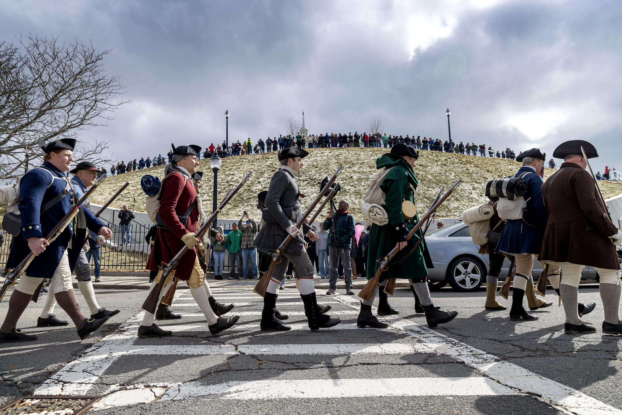 Reenactors commemorate the 250th anniversary of the Siege of Boston on Evacuation Day 2026. (Robin Lubbock/WBUR)