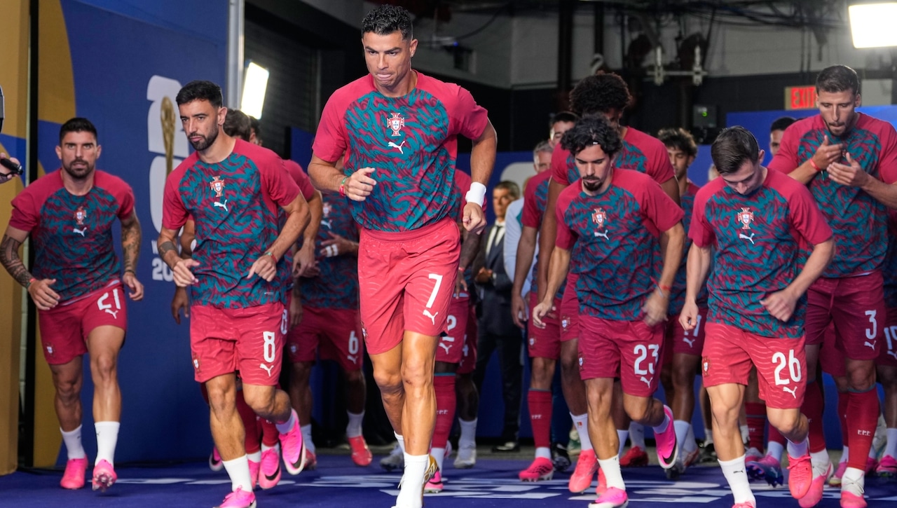 Portugal's Cristiano Ronaldo (7) leads the players onto the field to warm up ahead of the World Cup Group K soccer match between Colombia and Portugal in Miami Gardens, Fla., Saturday, June 27, 2026.