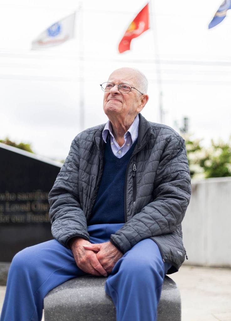 Otis Lull, 102, a veteran of World War II, Korea and Vietnam sits at Veterans Park on Tuesday, June 30, 2026 in Lynnwood, Washington. (Olivia Vanni / The Herald)