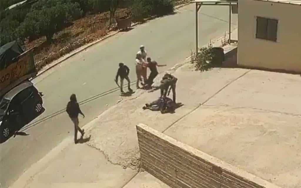 Police arrest man seen attacking a Palestinian last month while in IDF uniform