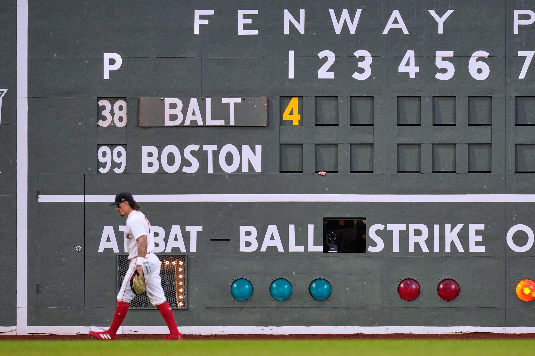 Boston Red Sox's Jarren Duran passes the scoreboard while trailing the Baltimore Orioles by four runs in the top of the first inning during the second baseball game of a doubleheader on July 22 in Boston. (Charles Krupa/AP)