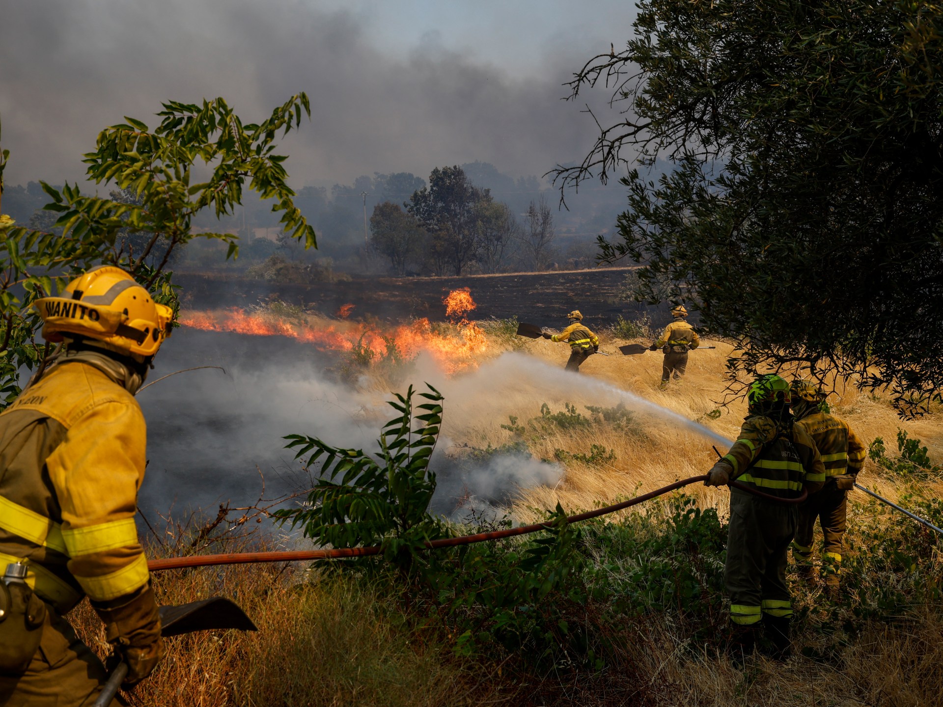 Spanish police accuse tractor driver of sparking wildfire as blazes spread | Environment News