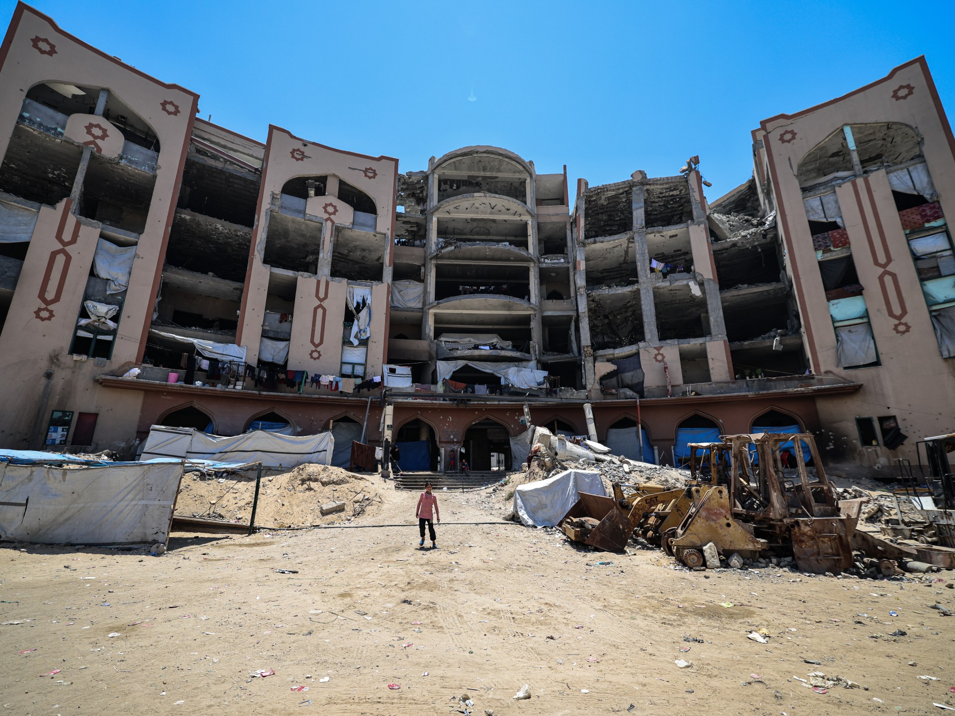 Students and staff work to bring Islamic University of Gaza back to life | Education News