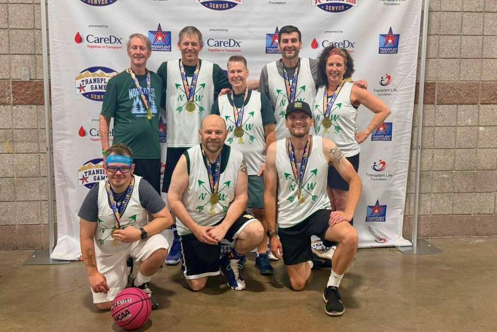 Mukilteo resident Turner Prewitt (back row, far left) and the Team Northwest Co-Ed Recreational Basketball pose with their gold medals at the 2026 Transplant Games of America, which took place in Denver from June 18-23, 2026. (Photo courtesy Nicole Andergard / Team Northwest)