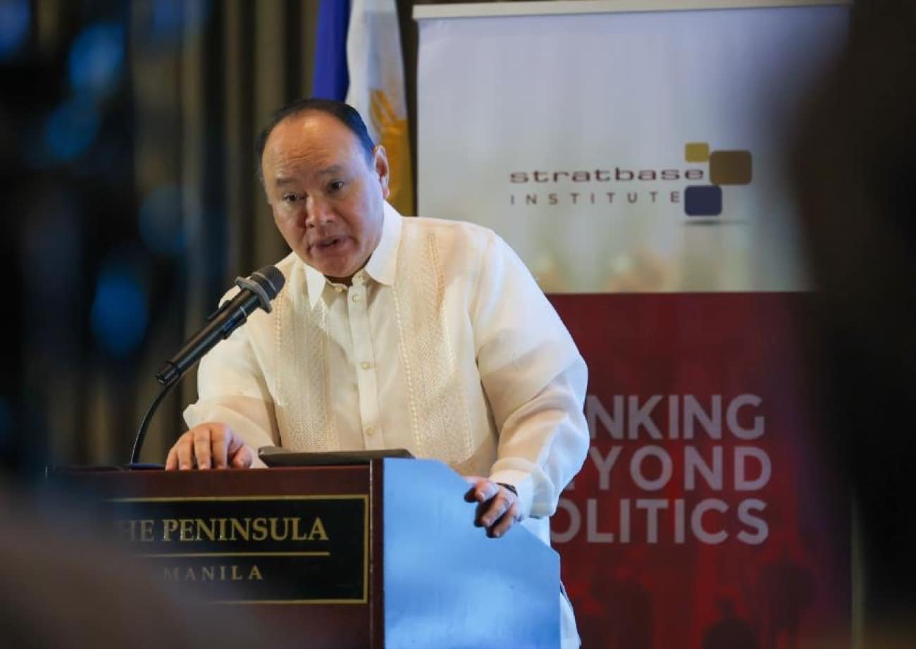 Defense Secretary Gilberto Teodoro Jr. delivers his speech on Friday during the Stratbase Institute’s commemoration of the 10th anniversary of the landmark 2016 arbitral award in Makati City. Photo from Stratbase Institute