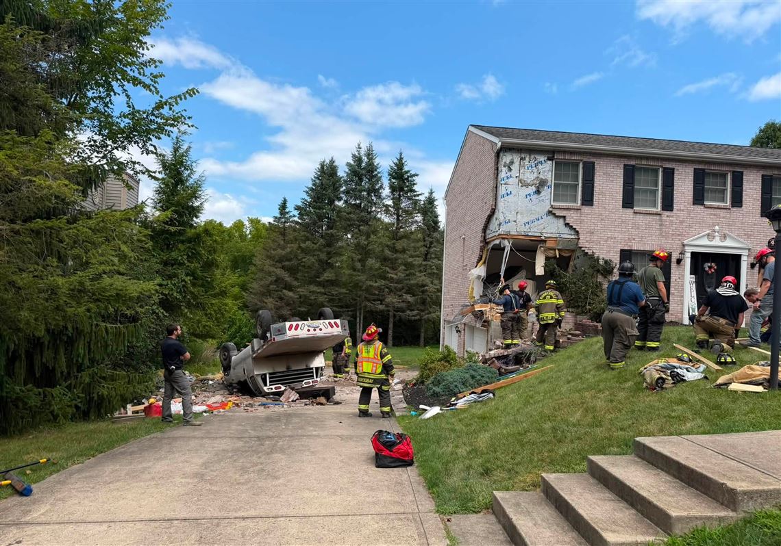 Two injured when flatbed truck slams into Murrysville home
