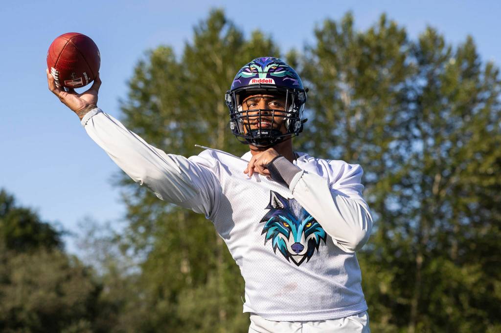 Washington Wolfpack quarterback Jaiave Magalei throws during practice on Friday, July 24, 2026 in Everett, Washington. (Olivia Vanni / The Herald)
