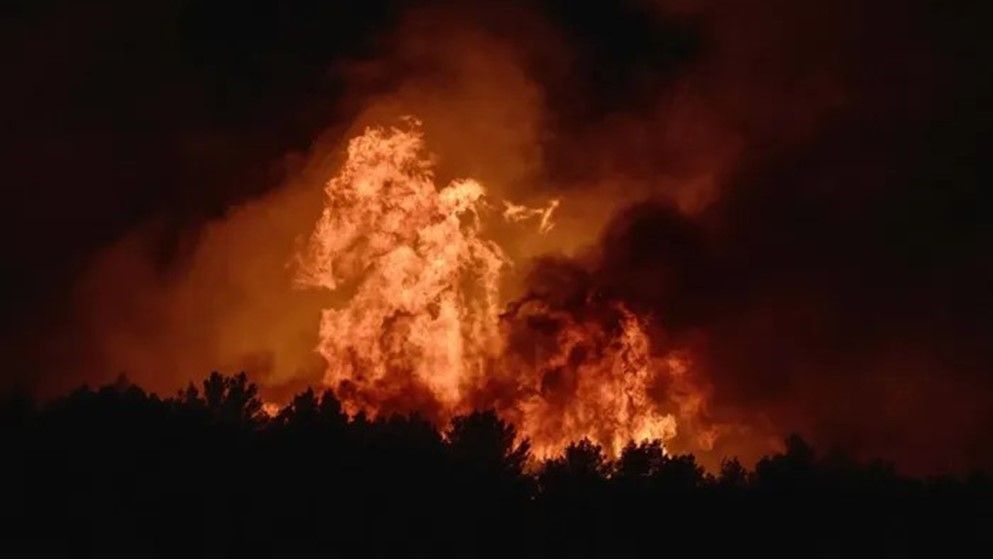 Wildfires Force Hundreds to Flee...
