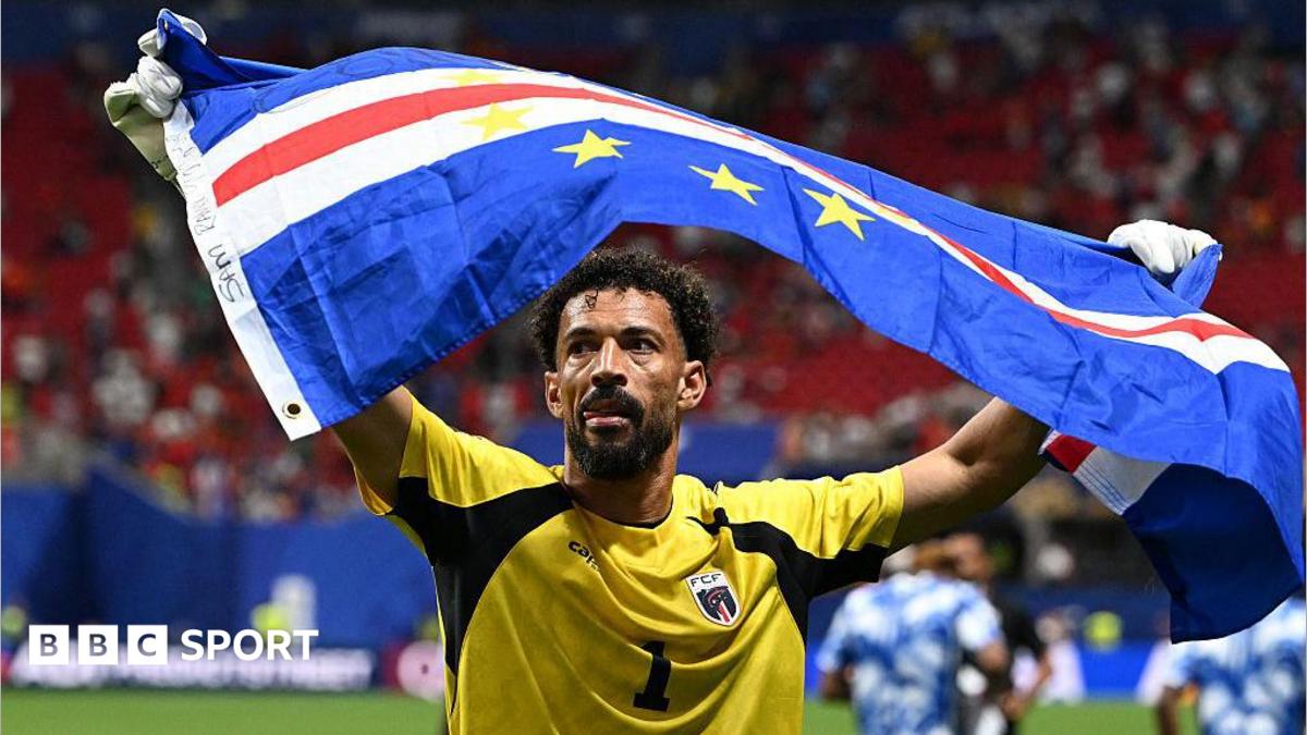 Vozinha holding Cape Verde flag