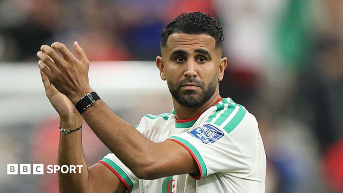 Riyad Mahrez applauds Algeria fans after the 2-0 World Cup defeat to Switzerland