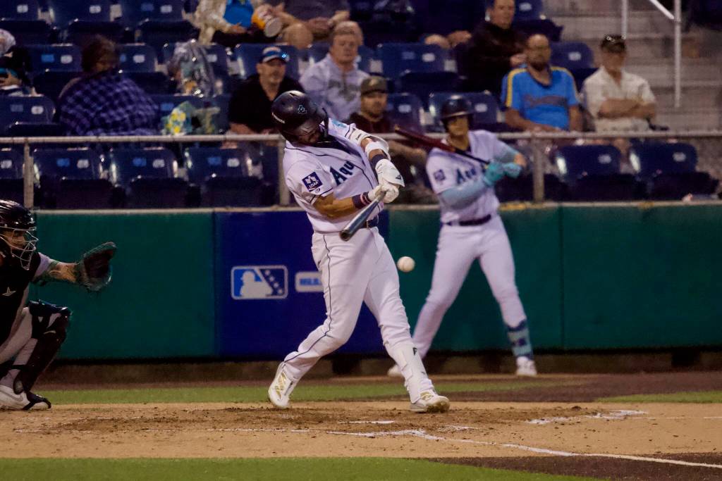 AquaSox infielder Austin St. Laurent makes contact during Everett’s 10-4 loss to Eugene at Everett Memorial Stadium in Everett, Washington on Aug. 25, 2026. (Joe Pohoryles / The Herald)