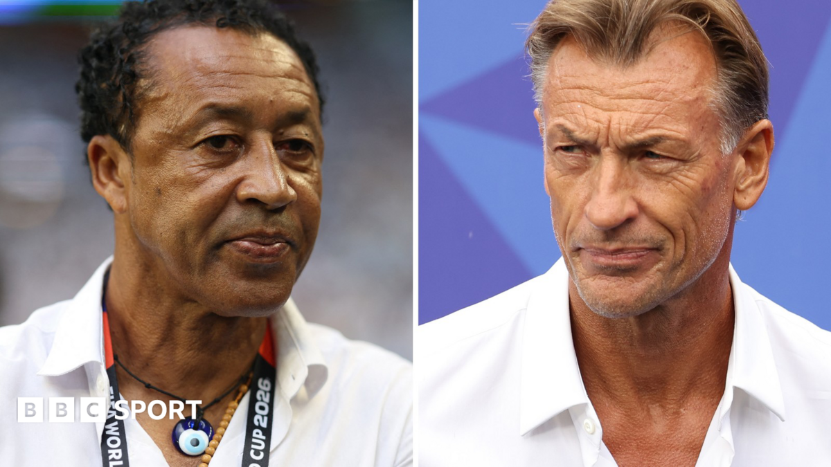 A split image shows close up headshots of Bubista and Herve Renard. Bubista wears a white shirt unbuttoned at the neck, two necklaces and a World Cup 2026 lanyard around his neck as he looks towards the camera, while Renard wears a similar white shirt and looks to his right with a pensive expression on his face