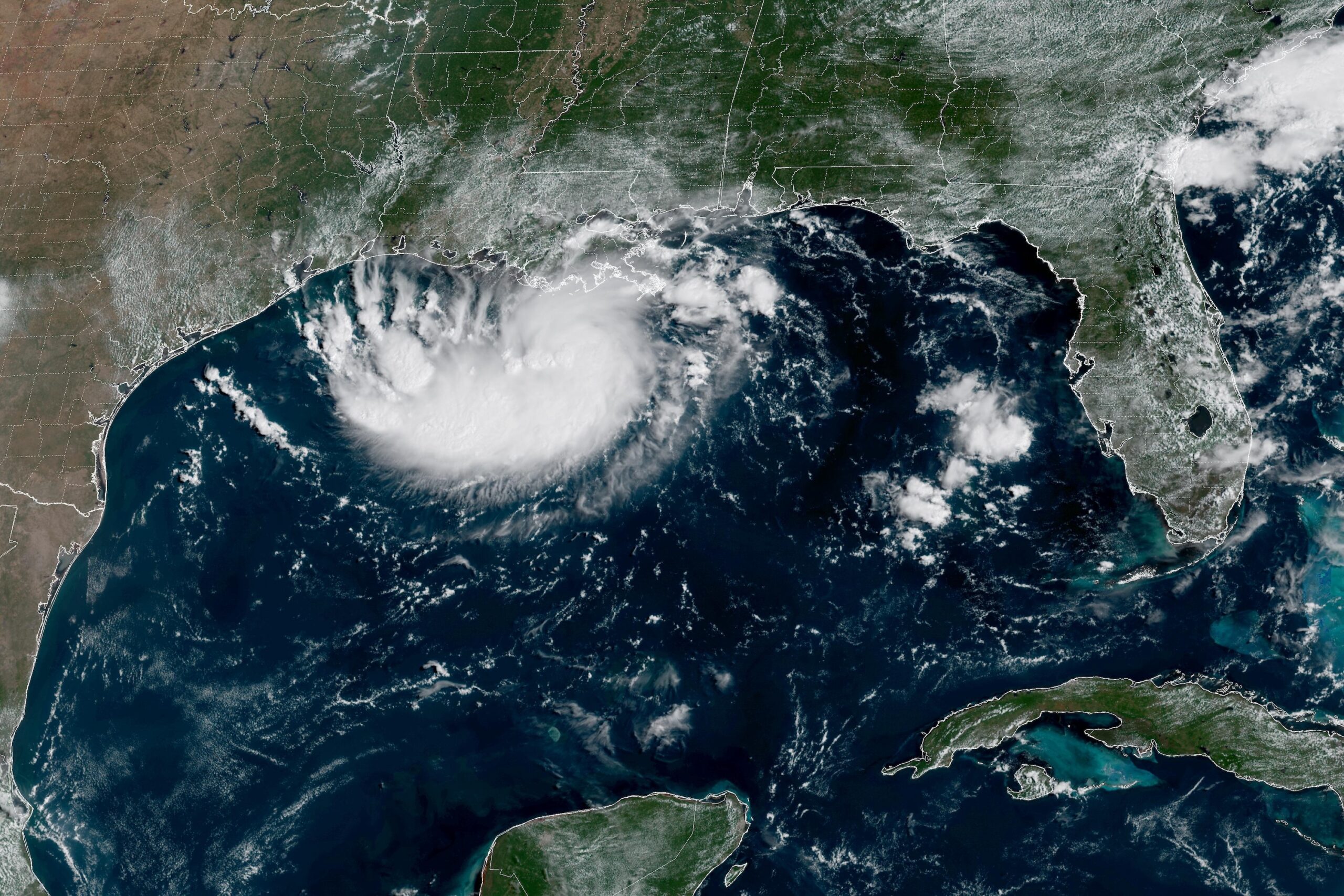 Coastal Texas and Louisiana warned of tropical storm as a potential hurricane moves toward Hawaii