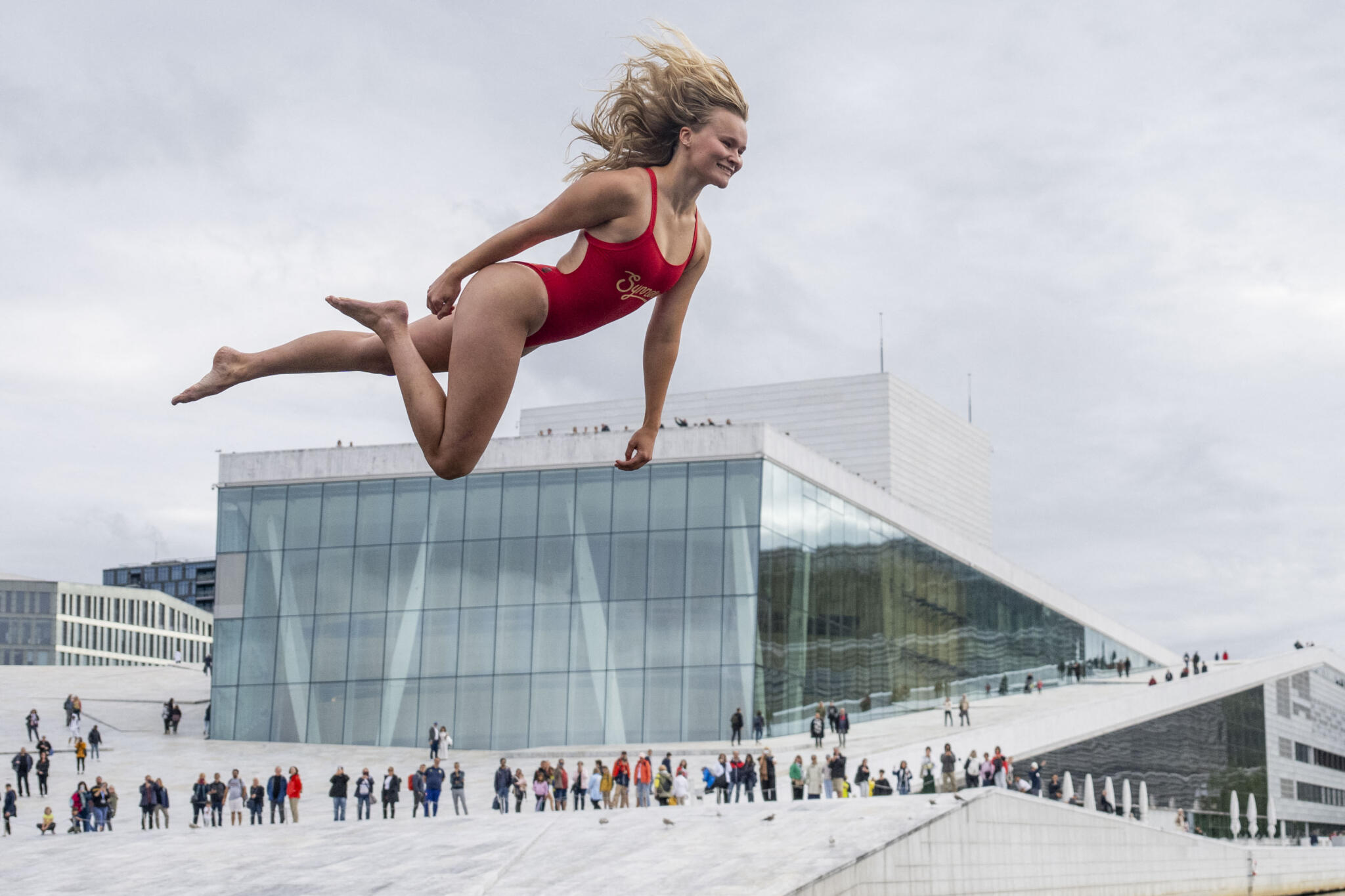 Asbjørg Nesje from Norway is a participant and trains in front of the Opera House in Oslo, Norway, on August 25, 2023, one day before the 2023 World Championship in Døds Diving (Death Diving). (Javad Parsa/AFP via Getty Images)