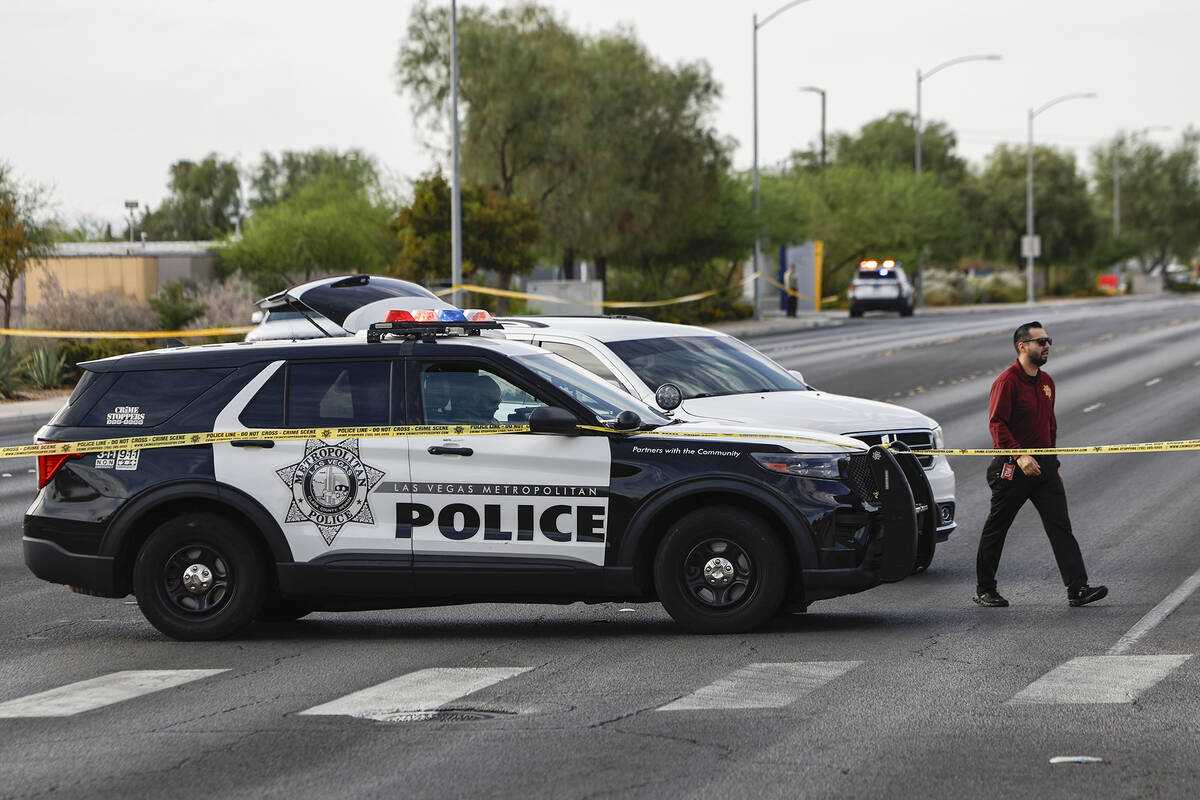 Las Vegas Metropolitan Police respond to an officer involved shooting early Friday morning near ...
