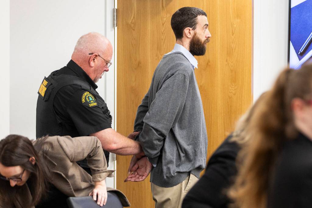 David Craft is led out of the courtroom in handcuffs after being found guilty by a jury in the murder of Daniel Lytton on Tuesday, Aug. 25, 2026 in Everett, Washington. Craft was found guilty on three felony charges, including premeditated first-degree murder with a deadly weapon. (Olivia Vanni / The Herald)