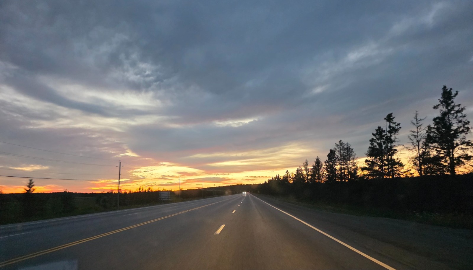 Mirage on the Road, Ontario, Canada - Photo of the Day