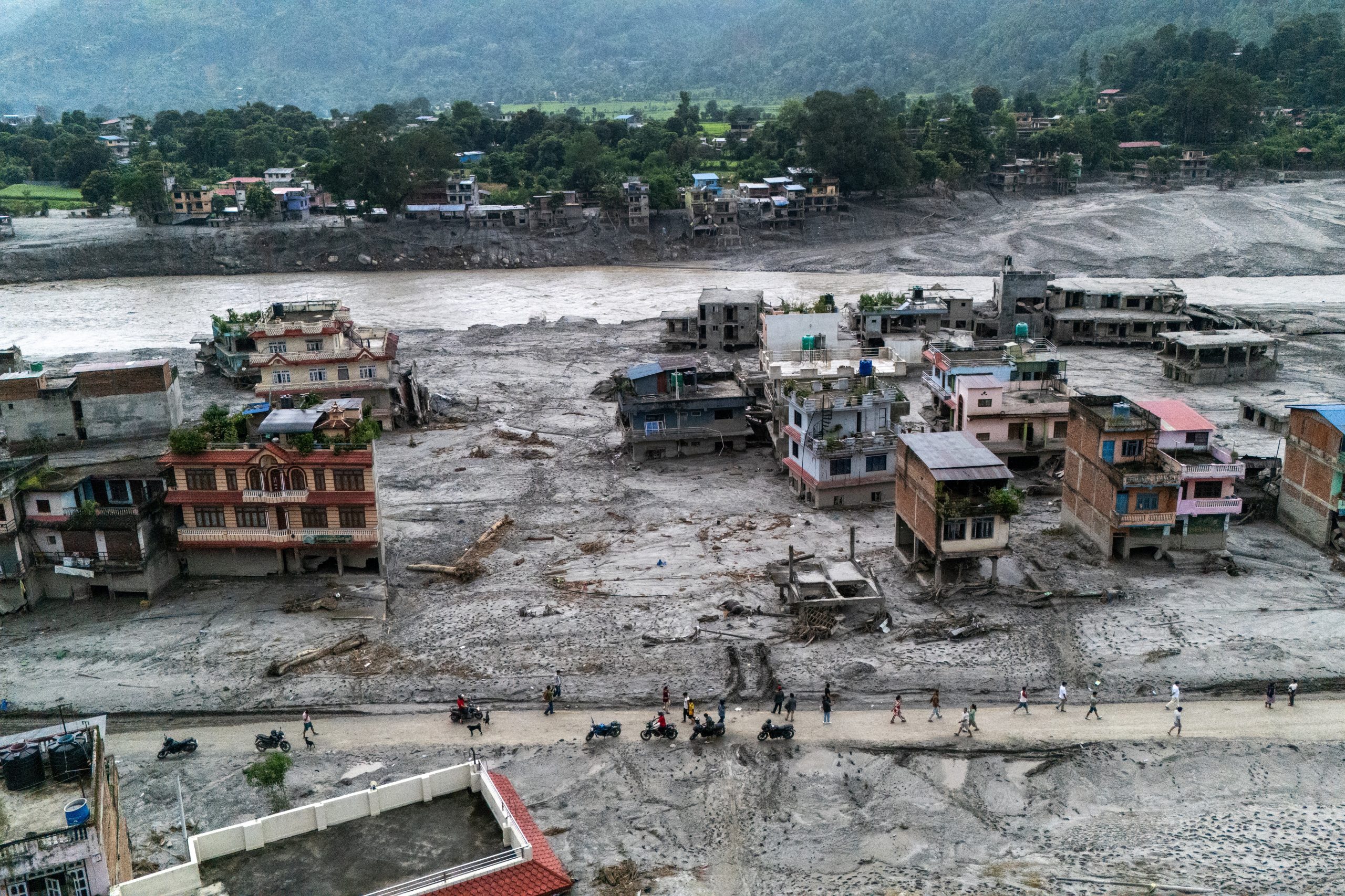 Nepal-China flood survivors reach safe areas as families await news of nearly 3,000 missing