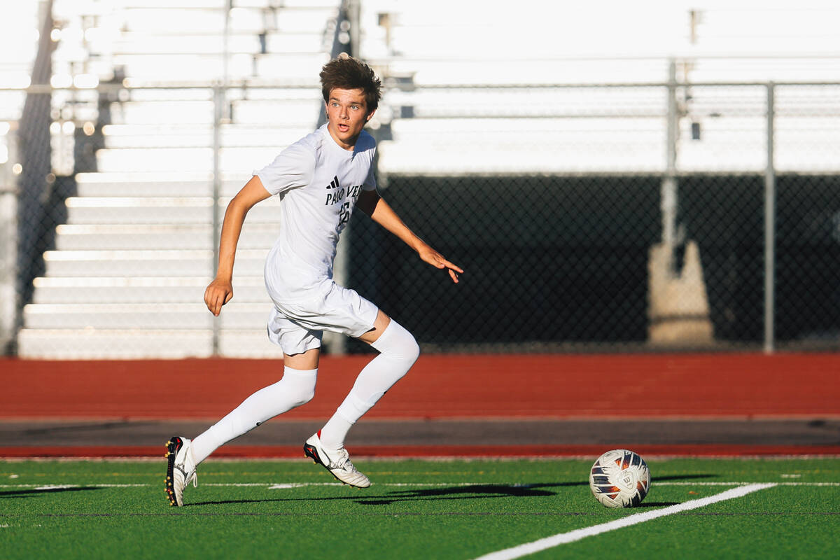 Palo Verde’s Zane Koogler kicks the ball down the field during a high school soccer game ...