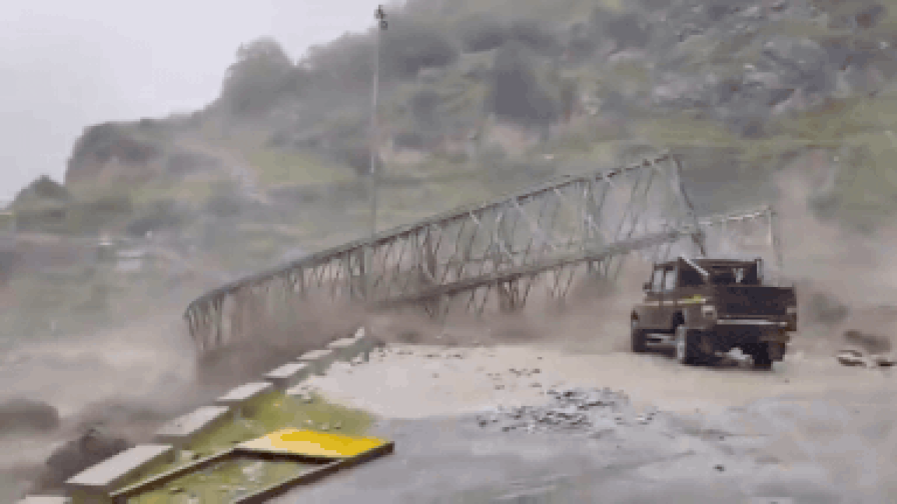 On camera: Swollen river sweeps away bridge after flash flood in Uttarakhand's Chamoli | India News