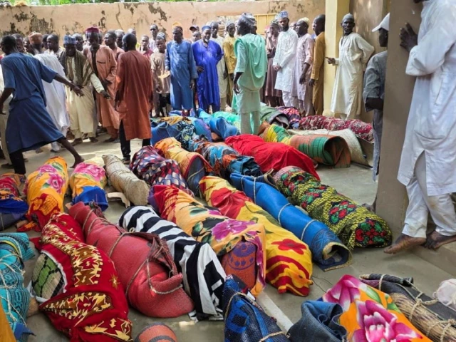 bodies of victims of a boat accident lie in the forecourt of a community mosque ahead of their burial in gorau sokoto state nigeria august 20 2026 picture taken with a mobile phone reuters