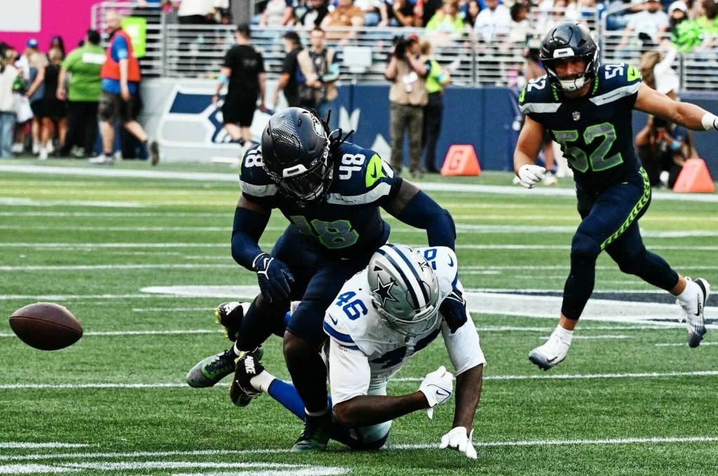 Seattle Seahawks linebacker Tyrice Knight breaks up a pass to Dallas Cowboys tight end Michael Trigg during an NFL preseason game on Saturday, Aug. 15, 2026 at Lumen Field in Seattle. (Photo courtesy of Seattle Seahawks)