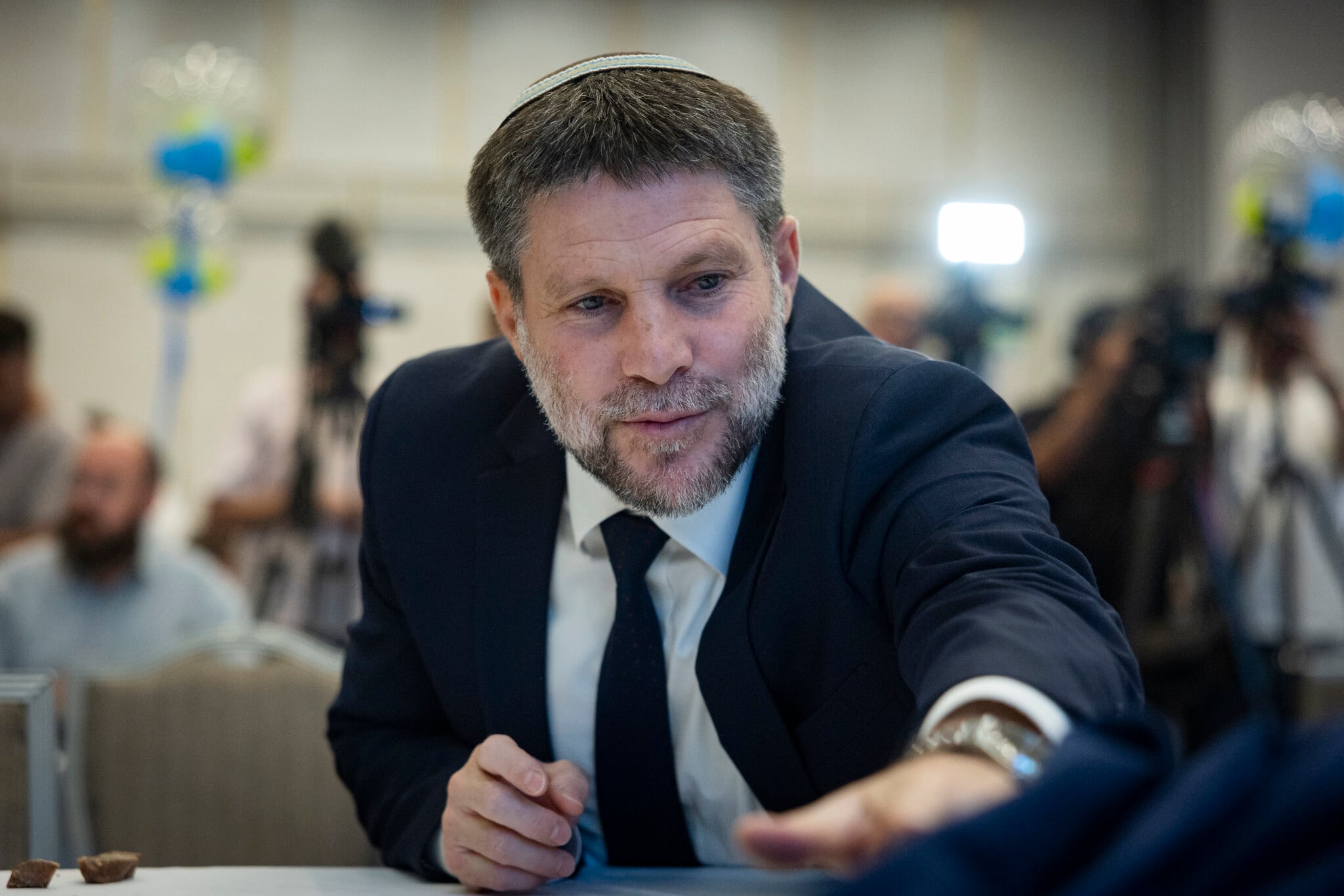 Smotrich placates coalition on Haredi draft, but pays a cost among settler base