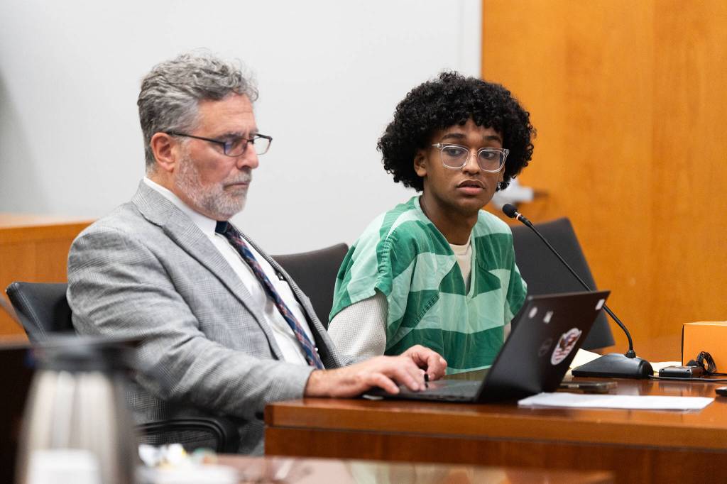 Samuel Gizaw, right, in Snohomish County Superior Court before he entered a guilty plea on Wednesday, Aug. 26, 2026, in Everett, Washington. (Will Geschke / The Herald)